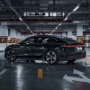 Which electric luxury sedan offers the longest range?