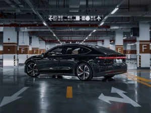Which electric luxury sedan offers the longest range?
